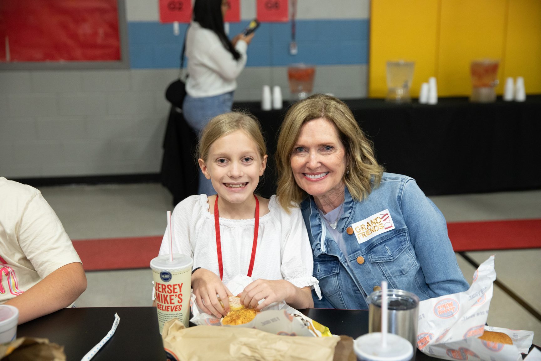 A Lubbock-Cooper student and a grandparent at lunch in the school cafeteria